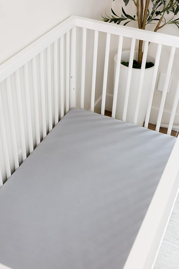 The Ollie Crib Sheet- Moisture-Wicking Material Keeps Baby Safe and Dry- Full Premium Elastic Perimeter- Easy to Pull On and Off- (Stone)