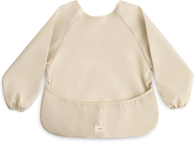 mushie Long Sleeve Baby Bib | Water Resistant Adjustable Fit for Ages 6-24 Months
