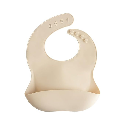 mushie Silicone Baby Bib | Adjustable Fit Waterproof Bibs (Shifting Sand)
