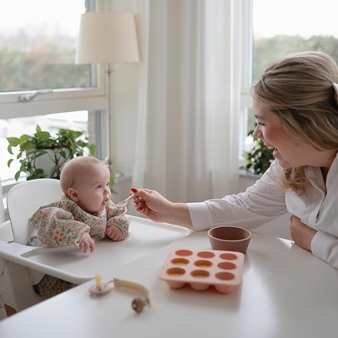 mushie Long Sleeve Baby Bib | Water Resistant Adjustable Fit for Ages 6-24 Months