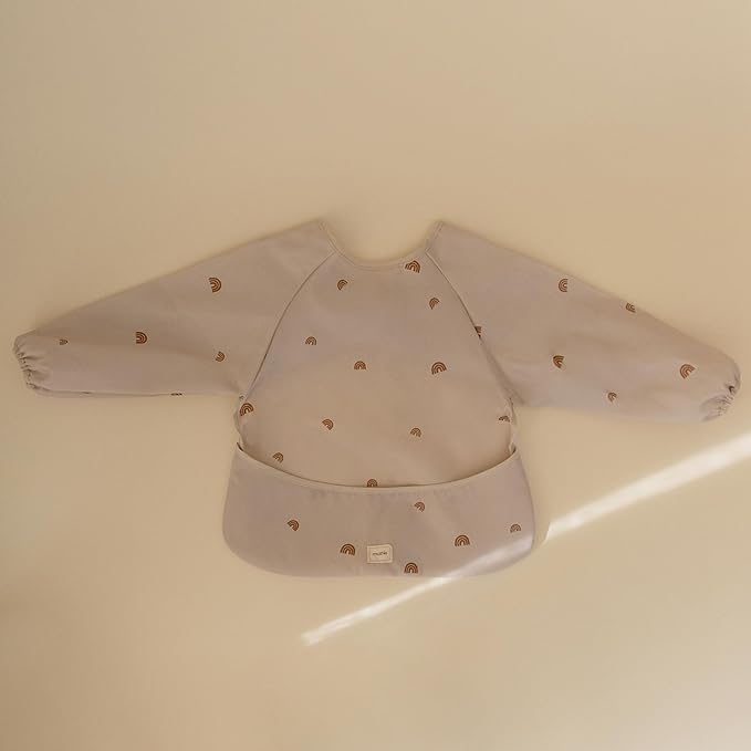 mushie Long Sleeve Baby Bib | Water Resistant Adjustable Fit for Ages 6-24 Months
