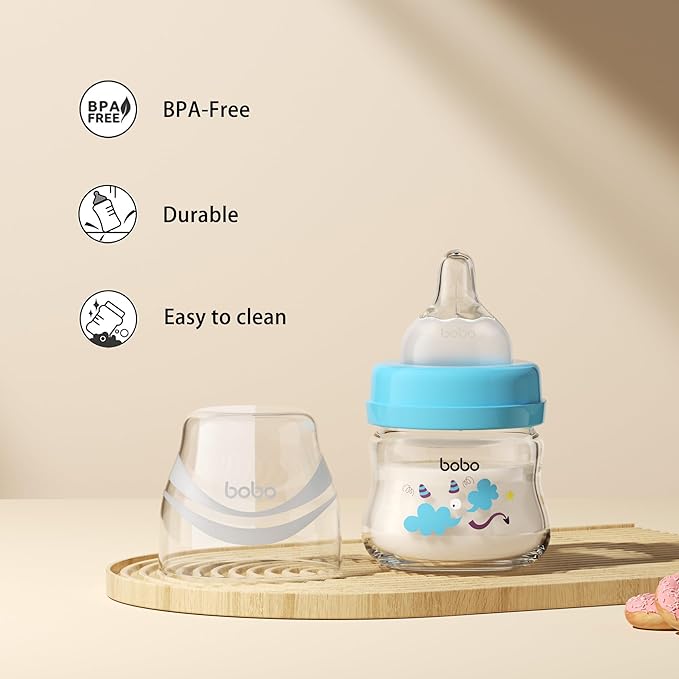 YOHKOH Glass Baby Bottles with Slow Flow Nipple, Newborn Anti-Colic Baby Bottles for 0+ Months, Wide Neck Feeding Bottle, Clear (Blue, 2.7oz (Pack of 2))