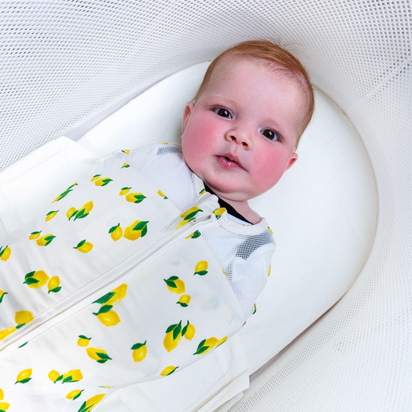 Happiest Baby SNOO Sleep Sack - 100% Organic Cotton Baby Swaddle Blanket - Doctor Designed Promotes Healthy Hip Development (Ivory Lemons, Large)