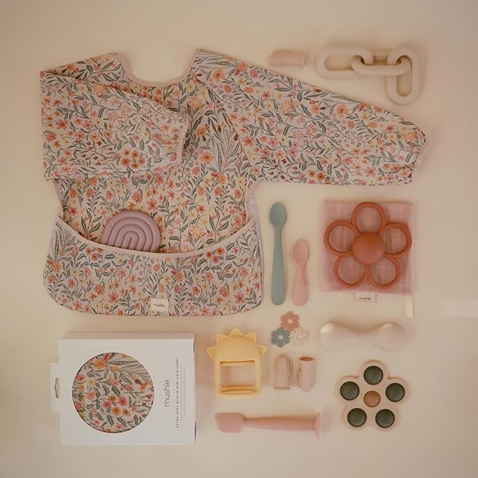 mushie Long Sleeve Baby Bib | Water Resistant Adjustable Fit for Ages 6-24 Months