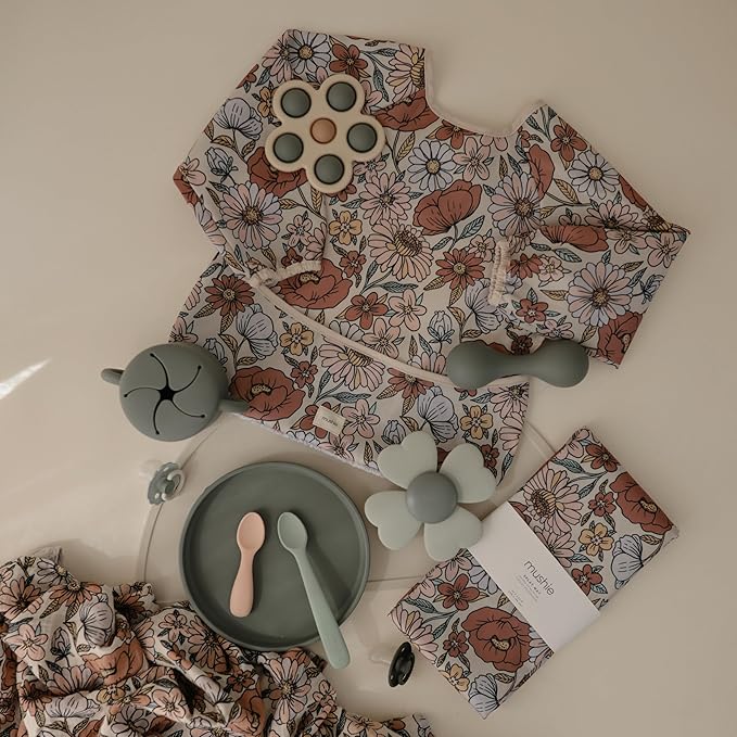 mushie Long Sleeve Baby Bib | Water Resistant Adjustable Fit for Ages 6-24 Months