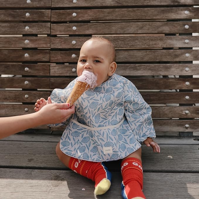 mushie Long Sleeve Baby Bib | Water Resistant Adjustable Fit for Ages 6-24 Months